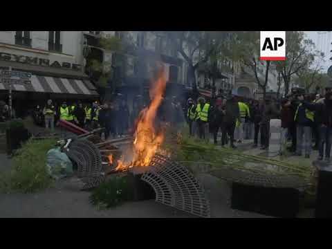 Paris protesters build barricades and set fires